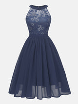 Navy blue lace and chiffon halter neck A-line dress, front view