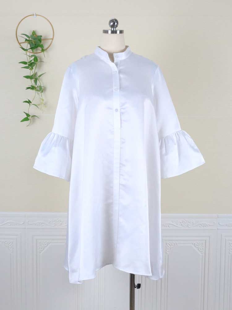 White A-line dress with bell sleeves and a high neckline displayed on a mannequin, front view.
