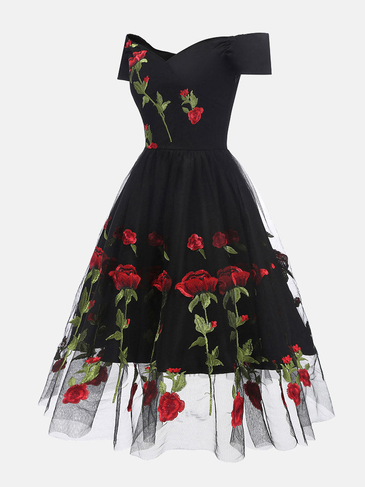 black off-the-shoulder midi dress with embroidered red roses and tulle skirt, side view