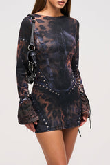 Front view of a bodycon dress with stud embellishments