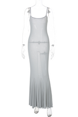 A sheer silver maxi dress displayed on a mannequin.