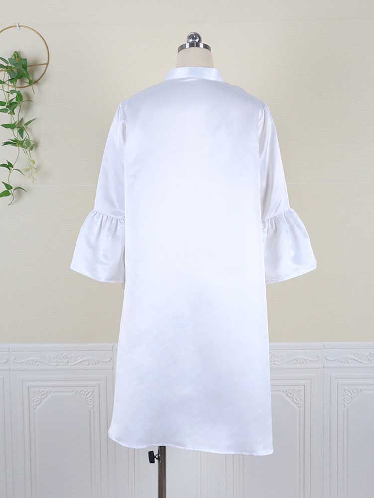 White A-line dress with bell sleeves and a high neckline displayed on a mannequin, back view.