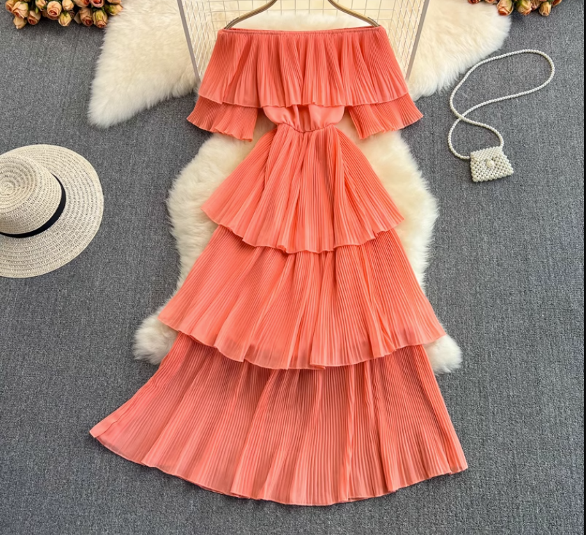 Coral tiered off-the-shoulder pleated dress
