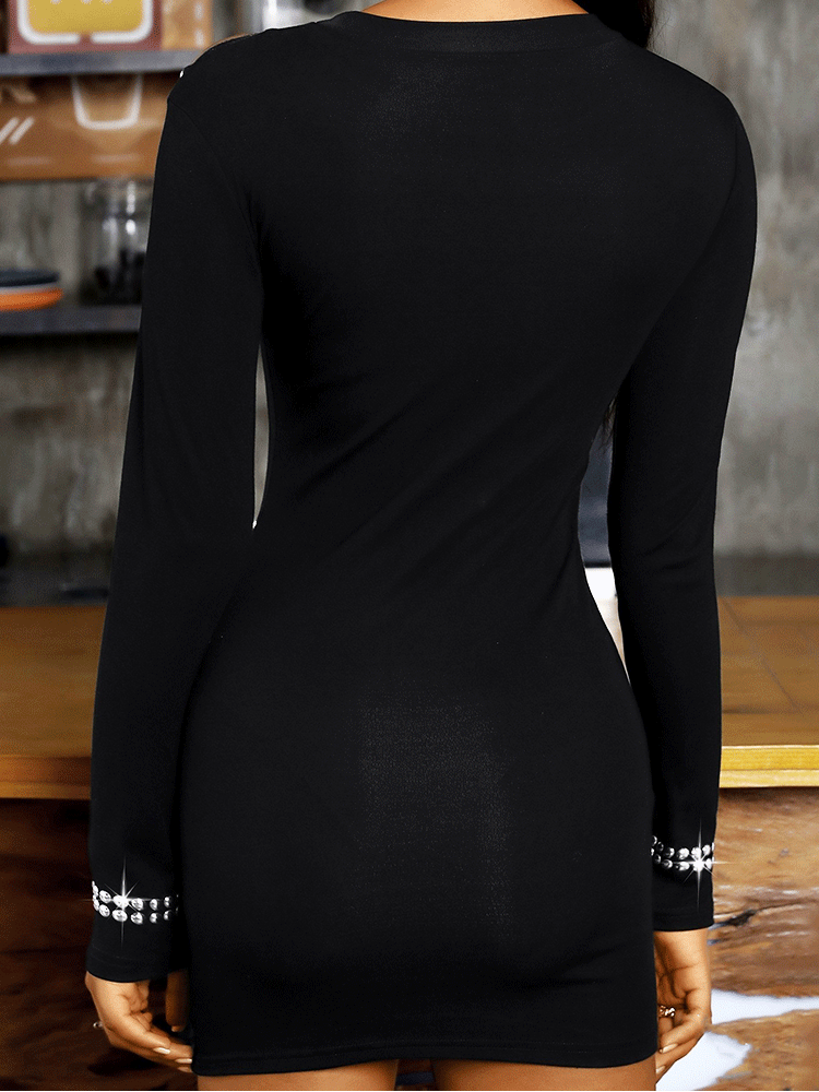 Back view of the black long-sleeved bodycon mini dress.