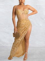 Close-up of a woman's torso in a sequined dress