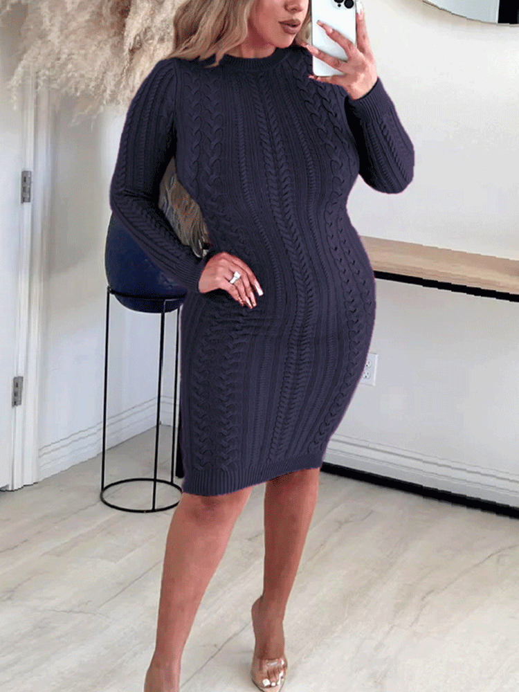 Woman wearing a navy blue cable knit dress from the front