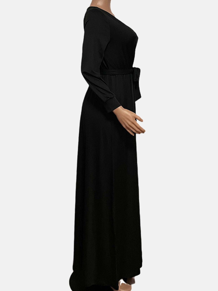 Side view of a black long-sleeve maxi wrap dress on a mannequin.