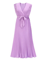 a long purple pleated dress with ruffled sleeves and a tie belt laid flat