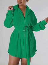 Close-up of the front of a black pleated shirt dress