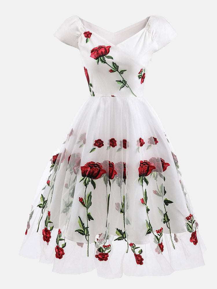 white off-the-shoulder midi dress with embroidered red roses and tulle skirt