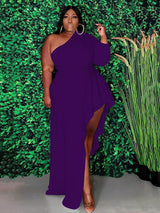 Woman wearing a purple one-shoulder maxi dress with an asymmetrical hemline and ruffle detail.