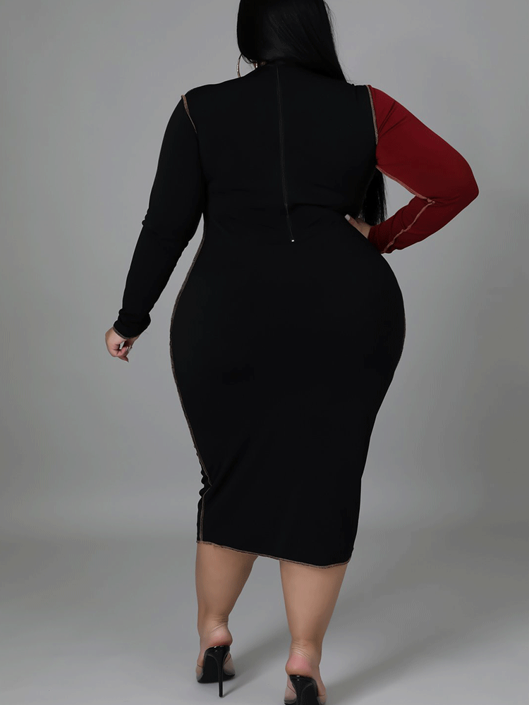 Rear view of a plus size woman showcasing the silhouette of the midi dress