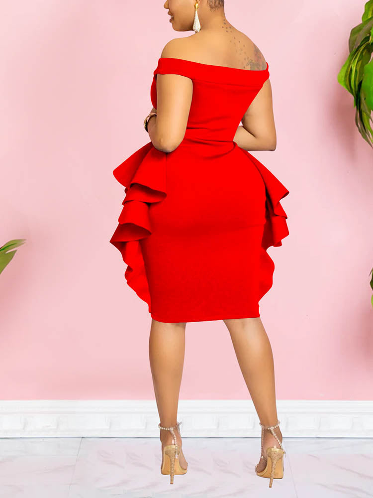 Back view of a woman wearing a red off-the-shoulder dress with ruffle details and an asymmetrical hemline.