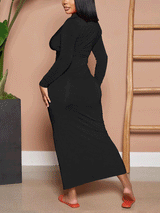 Back view of a woman wearing a black ruched button-down maxi dress