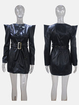 Mannequin display of a black faux leather V-neck dress with shoulder pads and a belted waist, front and back views