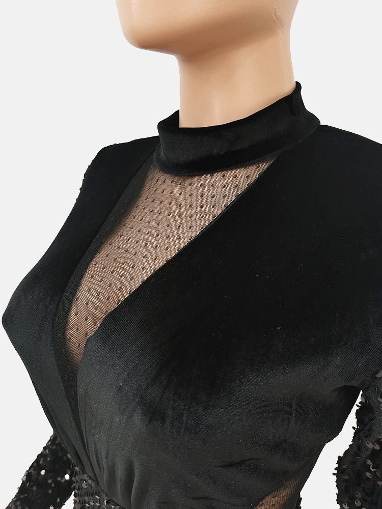 Close-up of the mock neck and plunging V-neck overlay of the black sequined dress.