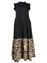 Black maxi dress with leopard print hem displayed flat