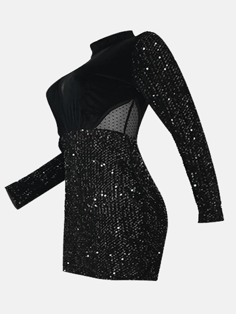 Side view of a black sequined mini dress with velvet bodice and mesh neckline.
