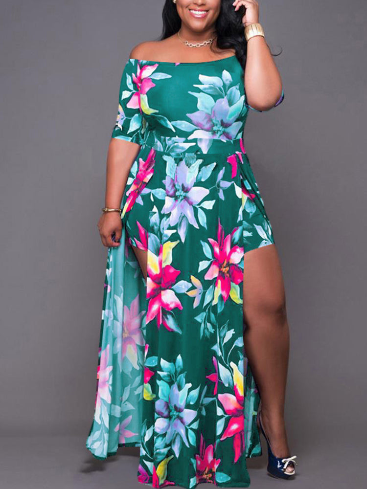 Front view of a woman in a green floral print off-the-shoulder maxi dress with a high leg slit.