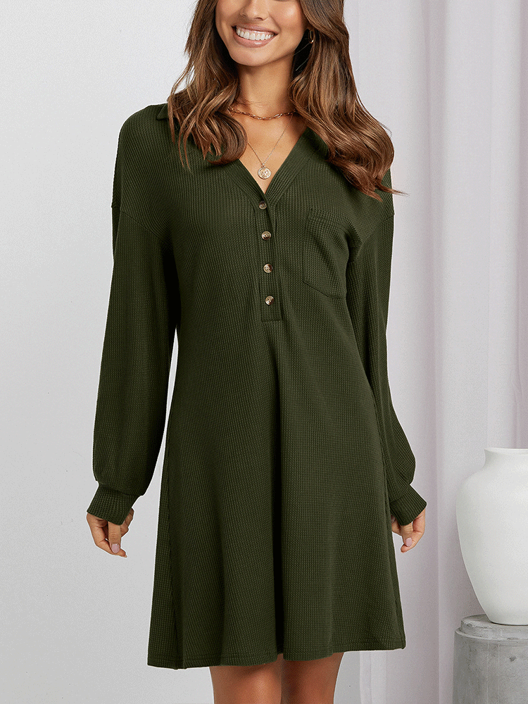 Side view of a woman in an olive green waffle knit shirt dress