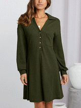 Full body shot of a woman in an olive green waffle knit shirt dress