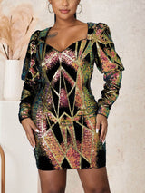 Woman wearing a black mini dress with a geometric sequin pattern and puff sleeves.