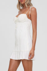 Textured mini dress with tie straps and ruffled hem - View 9 | Lwiis