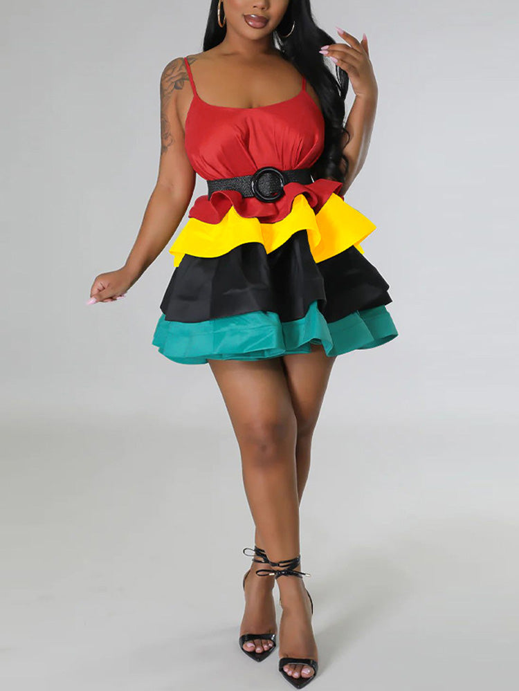 Front view of a woman wearing a tiered color-block mini dress with a belt.