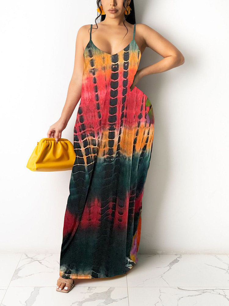 Woman wearing a tie-dye print maxi dress with spaghetti straps and a V-neckline, holding a yellow clutch.