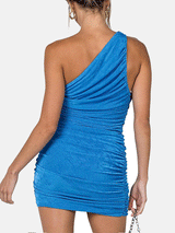 back view of a woman in a blue one-shoulder ruched mini dress