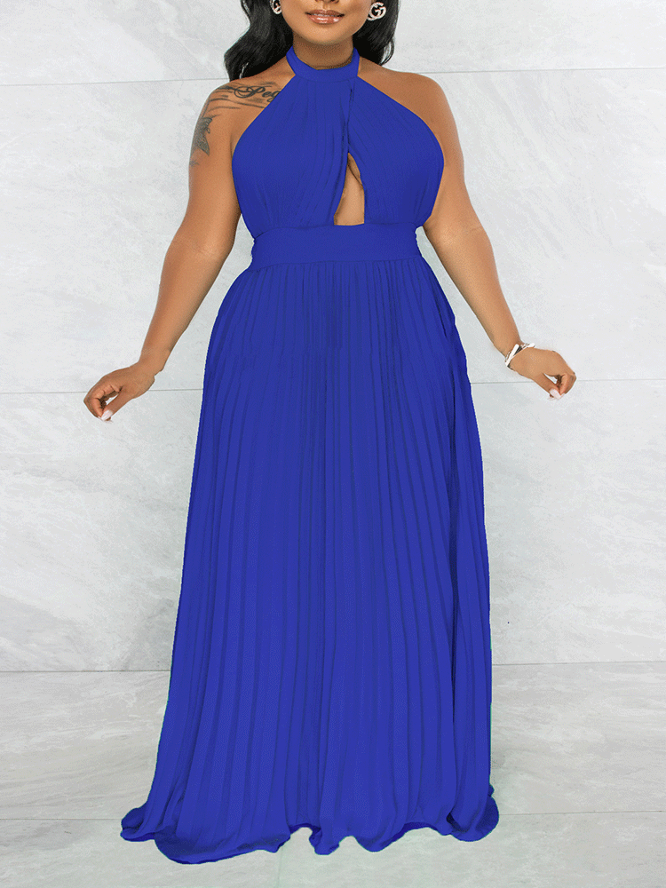 Woman wearing a royal blue halter neck maxi dress with a keyhole cutout and pleated skirt, front view.