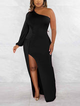 Front view of a woman in a long, black, one-shoulder dress with a high slit.