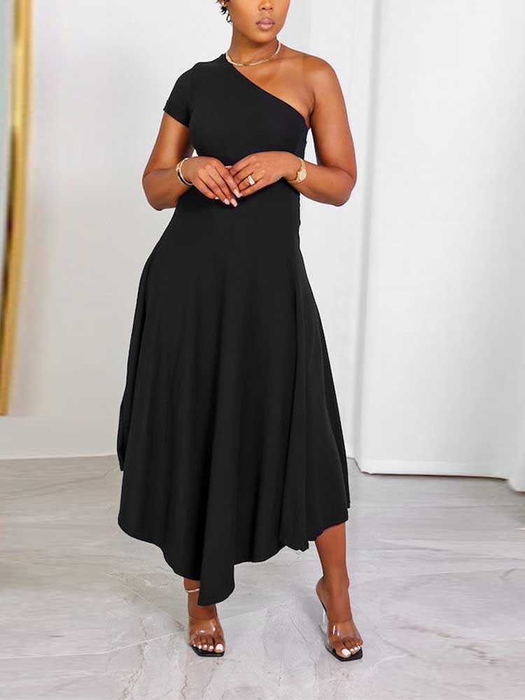 Woman wearing a black one-shoulder midi dress with an asymmetrical hemline.