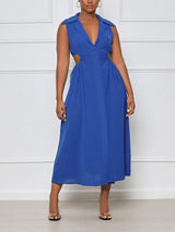 woman wearing a royal blue sleeveless midi dress with cut-out sides and a collared v-neckline