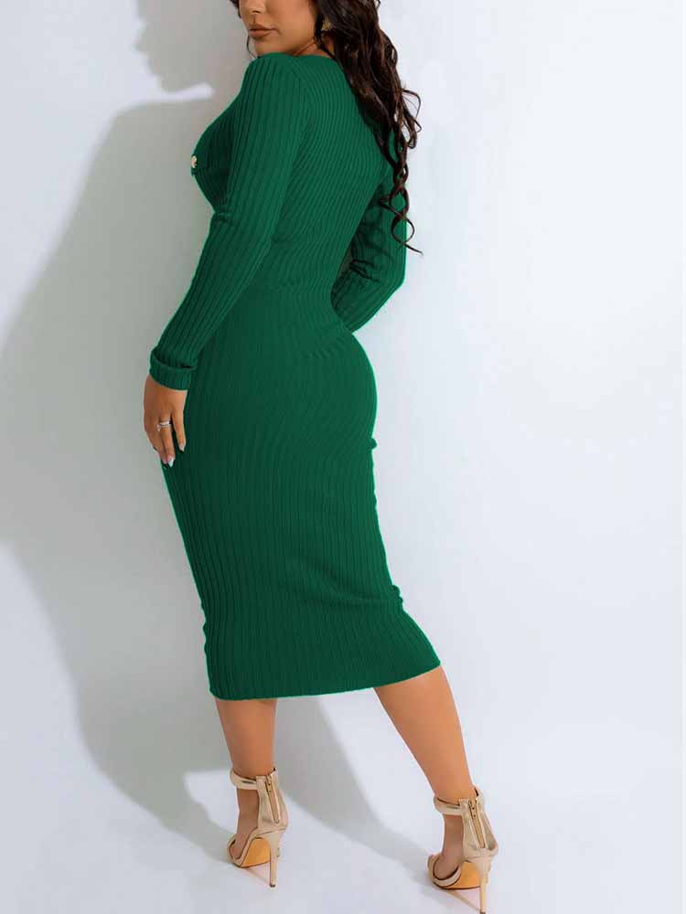 Back view of a woman in an emerald green ribbed knit midi dress.