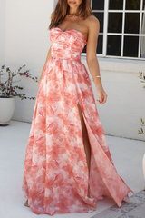 Rear view of a woman wearing a strapless floral print maxi dress