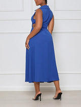 back view of a woman wearing a royal blue sleeveless midi dress with cut-out sides and a collared v-neckline