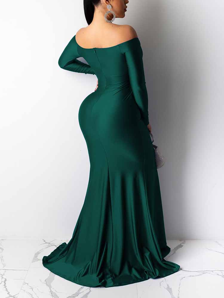 Back view of a woman in a long, off-the-shoulder, green satin dress with a mermaid skirt.