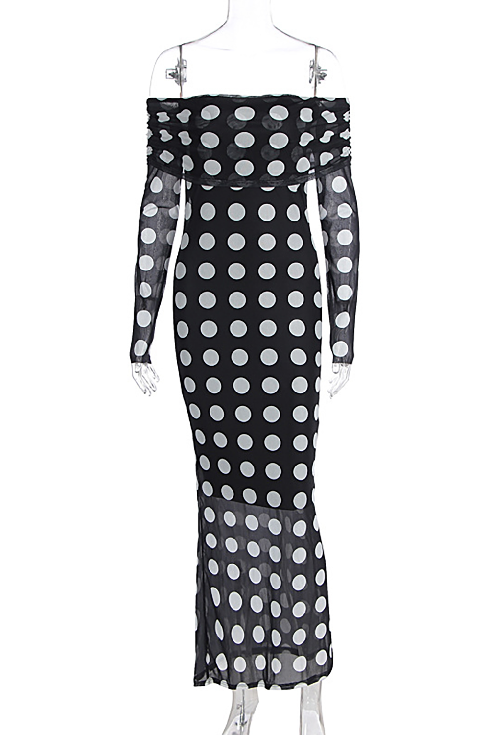 A black and white polka dot off-the-shoulder maxi dress with long sleeves displayed on a mannequin against a white background.