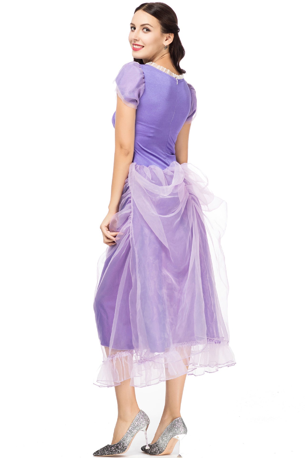 Back view of a woman in a purple costume dress