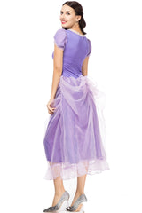 Back view of a woman in a purple costume dress