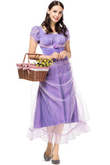 Woman in a purple costume dress with hands clasped