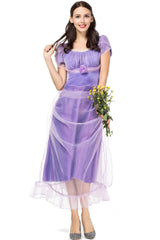 Woman in a purple costume dress holding a bouquet of yellow flowers