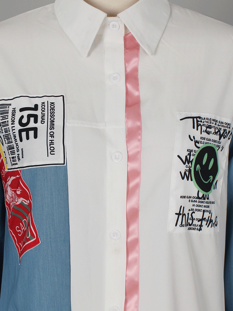Close-up of the collar and chest area of a colorblock shirt dress with appliqué patches