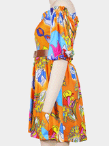 Side view of the off-the-shoulder mini dress with puff sleeves and abstract print
