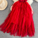 Close-up of the red tiered tulle skirt