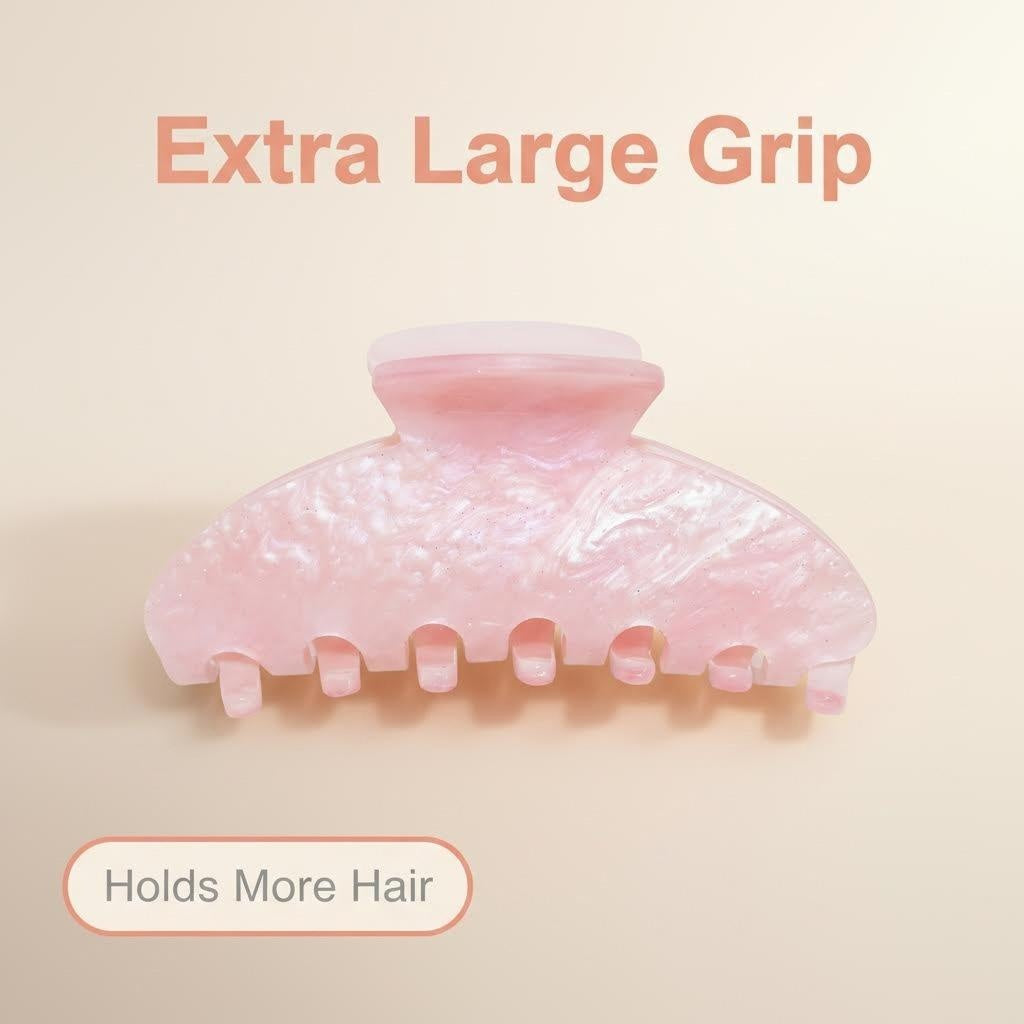 Pink pearlescent claw clip with text 'Extra Large Grip' and 'Holds More Hair'