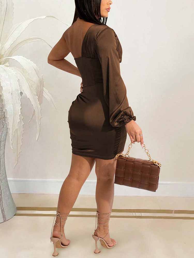 Back view of a woman in a one-shoulder chocolate brown satin mini dress