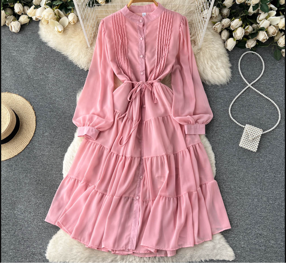 Pink chiffon tiered midi dress with puffed sleeves and self-tie belt
