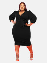 Plus-size black V-neck wrap dress with puff sleeves and self-tie belt